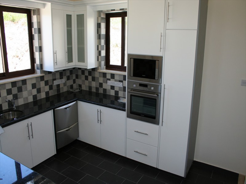 Kitchen finished. House is habitable and we have moved in - April 2009